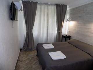 Гостиница Ripario Econom Отрадное Улучшенный двухместный номер с 1 кроватью или 2 отдельными кроватями-1